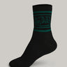 Pair of black Von Dutch classic socks with logo detail, made by Bonkerscorner UAE, displayed flat on a neutral background.