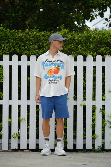 Oversized California Oranges shirt by Bonkerscorner UAE featuring vibrant orange stripes and a relaxed fit.
