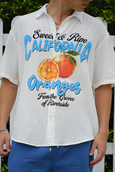 Oversized California Oranges shirt by Bonkerscorner UAE featuring bold orange and white stripes on soft fabric.