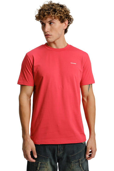 Man wearing a cherry red Supima cotton regular fit t shirt styled for a clean everyday look. A strong example of Valentine’s Day outfit ideas for men, showcasing a minimal Valentine’s Day dinner outfit men can wear for a relaxed yet polished date night style.