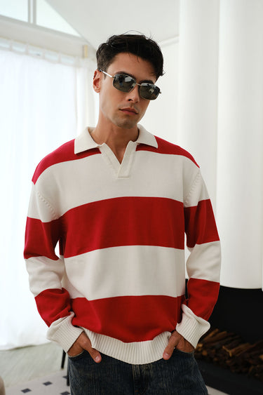 Man wearing a red striped V-neck knit polo styled with sunglasses for a smart casual look. A strong example of men’s Valentine’s Day outfit ideas, showcasing a stylish Valentine’s Day dinner outfit men can wear for a polished yet relaxed date night.
