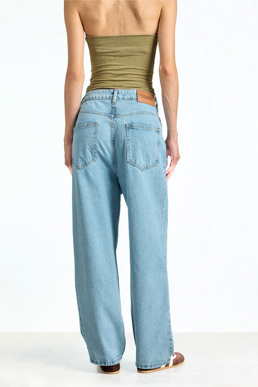 Light blue Ice Fade Relaxed Fit Jeans by Bonkerscorner UAE displayed on a model with casual styling.