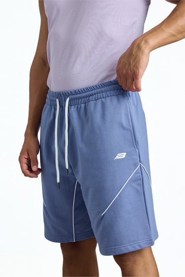 Blue Motionline shorts by Bonkerscorner UAE featuring a sleek design and comfortable fit, shown on a model.
