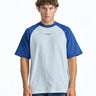 Oversized varsity raglan T-shirt by Bonkerscorner UAE featuring contrasting sleeves and a casual fit.