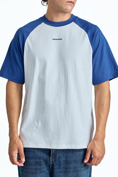 Bonkerscorner UAE varsity raglan oversized T-shirt featuring contrasting sleeves and classic athletic style.