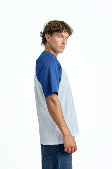 Bonkerscorner UAE varsity raglan oversized T-shirt in white with contrasting sleeves, casual and comfortable fit.