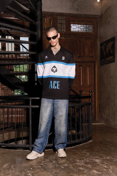 Bonkers Corner Ace full sleeves heavy weight polo shirt in dark color, featuring a classic collar and button placket.