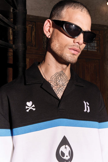 Bonkers Corner Ace full sleeves heavy weight polo shirt in dark color, showing its textured fabric and classic collar design.