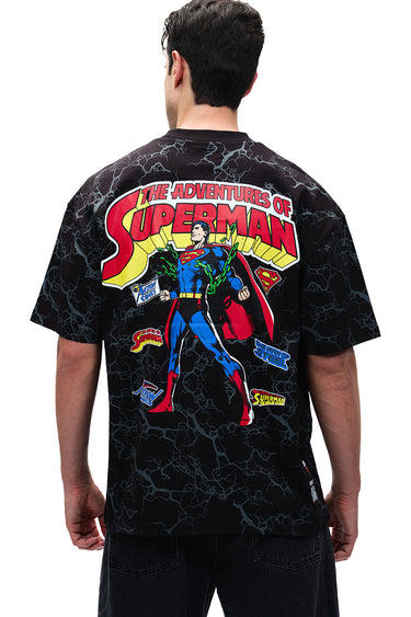 Black oversized Action Out Of Comics T-shirt by Bonkers Corner, featuring bold graphic print, casual fit, and comfortable fabric.