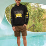 Black hoodie with "Ahoy" graphic from Bonkers Corner, featuring a comfortable fit and casual style.