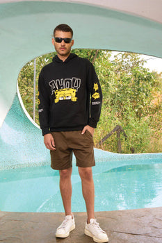 Black hoodie with "Ahoy" graphic from Bonkers Corner, featuring a comfortable fit and casual style.