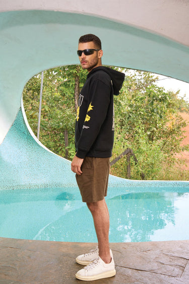 Black hoodie with "Ahoy" graphic from Bonkers Corner, featuring a comfortable fit and casual style.