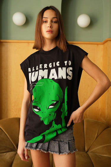 Bonkers Corner oversized tank top with "Allergic To Humans" graphic, casual fit, lightweight fabric, white color, front view.