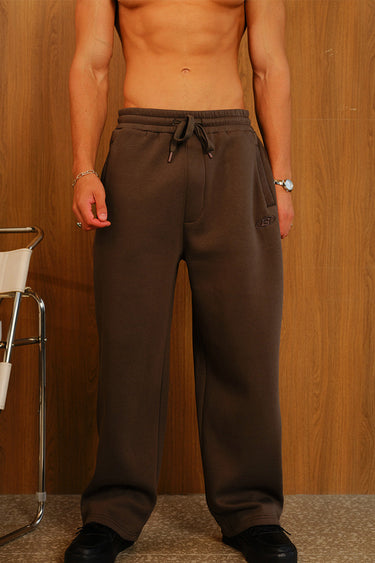 Ash Olive On The Go Joggers by Bonkers Corner, showing lightweight olive green joggers with a relaxed fit and elastic waist.