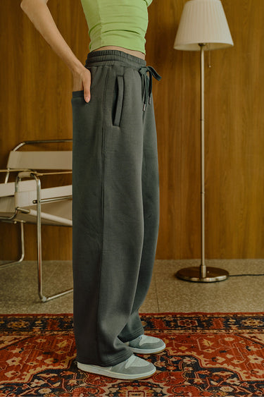 Ash Olive On The Go Joggers by Bonkers Corner, featuring lightweight olive-green fabric and relaxed fit for casual comfort.