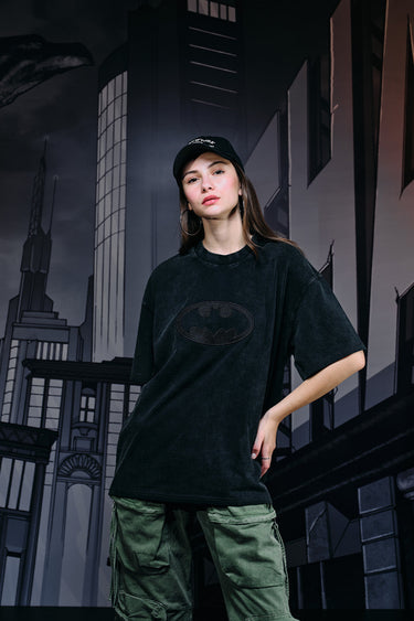 Faded oversized T-shirt with bat emblem design from Bonkers Corner, featuring a relaxed fit and stylish graphic print.