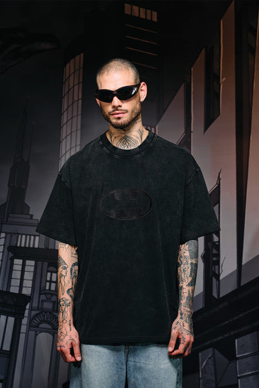 Faded oversized T-shirt featuring a bat emblem design from Bonkers Corner, with a relaxed fit and casual style.
