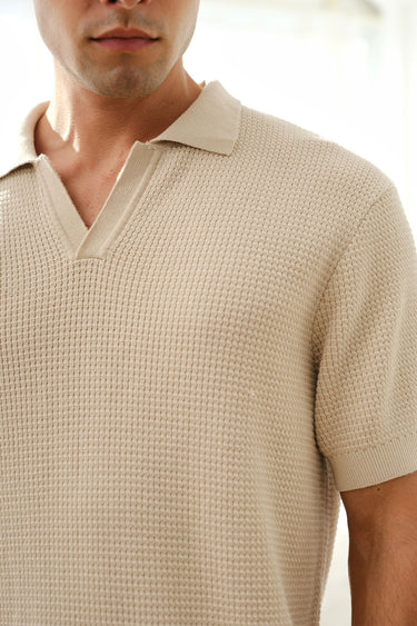 Beige knit textured polo T-shirt from Bonkers Corner, featuring a classic collar and subtle knit pattern.