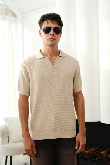 Beige knit textured polo T-shirt by Bonkers Corner, close-up of fabric and collar detail.