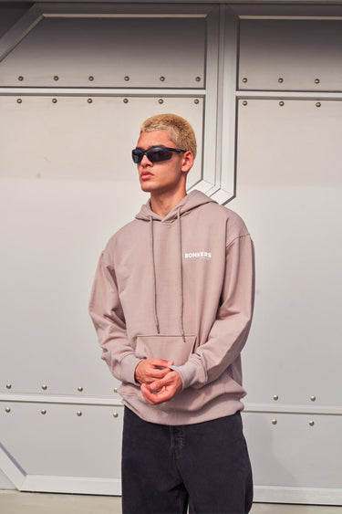 Beige limited edition hoodie by Bonkers Corner, featuring a comfortable fit and stylish design.