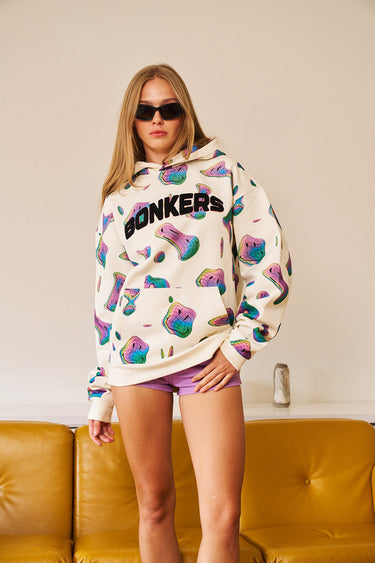 Beige Smiley Originals Hoodie by Bonkers Corner, featuring a relaxed fit and playful smiley face design on soft fabric.