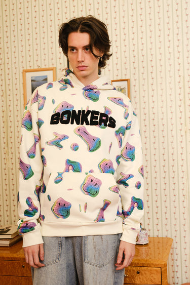Beige Smiley Originals hoodie by Bonkers Corner, featuring a relaxed fit and cheerful smiley face design.