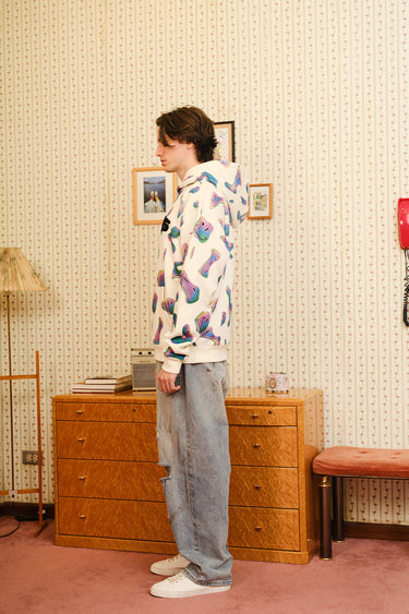 Beige Smiley Originals hoodie by Bonkers Corner featuring a relaxed fit and playful smiley face design on soft fabric.