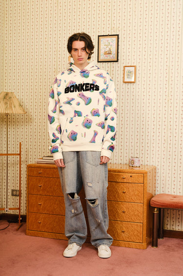 Beige Smiley Originals hoodie by Bonkers Corner, featuring a relaxed fit and playful smiley face design on soft fabric.