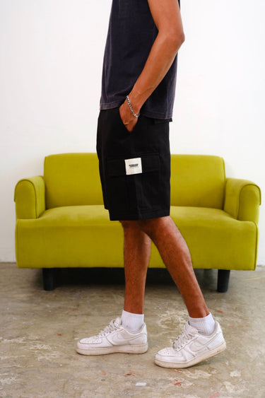 Black authentic utility shorts by Bonkers Corner featuring multiple pockets and utilitarian design for casual wear.