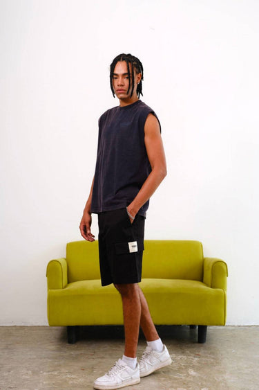 Black authentic utility shorts by Bonkers Corner, featuring practical pockets and durable fabric for casual wear.