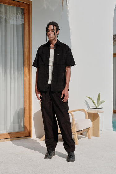 Black corduroy shirt from Bonkers Corner, featuring a casual fit with button-up front and classic collar.