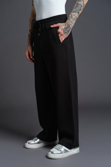 Black Bonkers Corner everyday joggers, casual athletic pants with a relaxed fit, shown on a plain background.