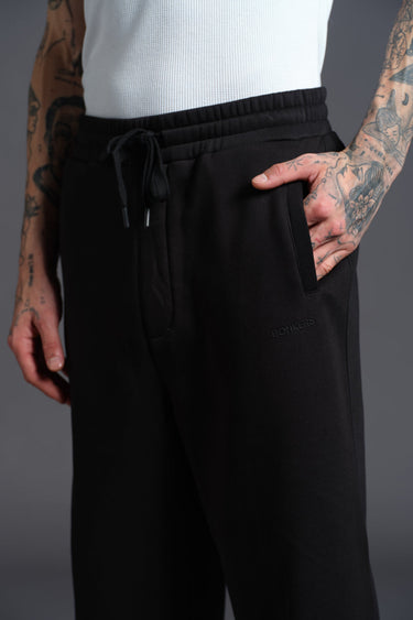 Black Bonkers Corner Everyday Joggers, slim fit with elastic waistband and pockets, shown on a model.