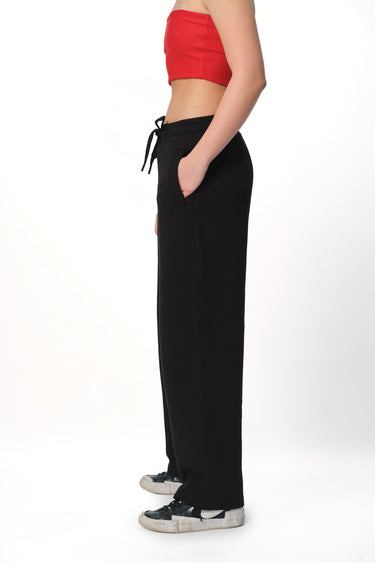 Black everyday joggers by Bonkers Corner featuring a comfortable fit and casual style, shown laid flat.