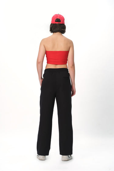 Black Bonkers Corner everyday joggers laid flat, showing the comfortable fit and elastic waistband.