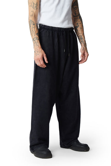 Black faded loose fit pants by Bonkers Corner, shown on model with relaxed style and casual fit.
