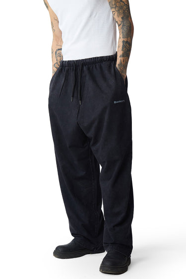 Black faded loose fit pants by Bonkers Corner, shown with relaxed fit and casual style in the product image.