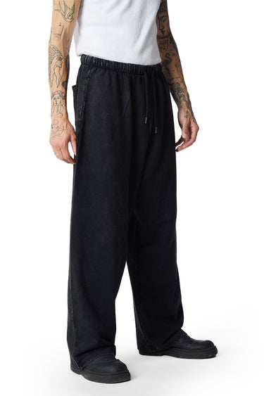 Black faded loose fit pants by Bonkers Corner, showing relaxed style and comfortable fit in a casual fashion look.