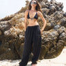 Black faded loose fit pants from Bonkers Corner, shown on a model with relaxed style and casual fit.
