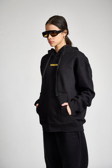 Black oversized heavyweight hoodie by Bonkers Corner, made of fleece, featuring a relaxed fit and signature style.