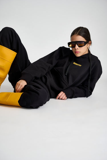 Black oversized heavyweight fleece hoodie by Bonkers Corner, featuring a relaxed fit and cozy fleece material.