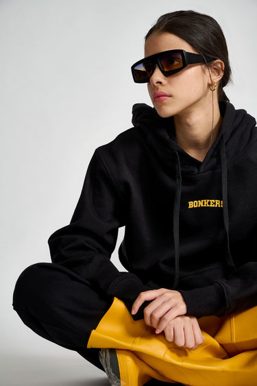 Black oversized heavyweight fleece hoodie by Bonkers Corner, featuring a relaxed fit and cozy fleece material.