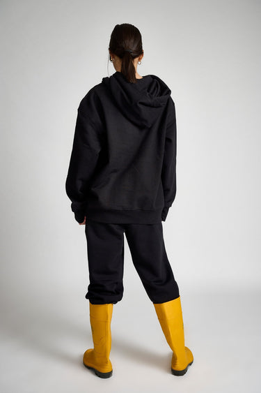 Black Bonkers Corner oversized heavyweight fleece hoodie with signature branding, featuring a relaxed fit and soft fleece fabric.