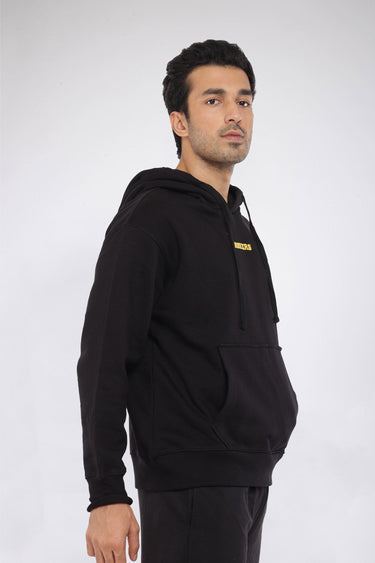 Black oversized heavyweight hoodie from Bonkers Corner with fleece lining, featuring a relaxed fit and signature design details.
