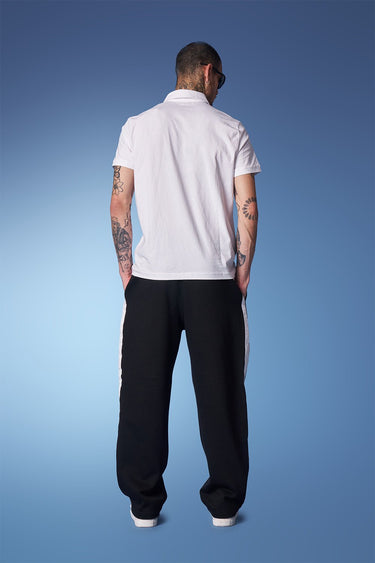 Black sporty straight fit pants by Bonkers Corner, shown with a comfortable waistband and athletic style.