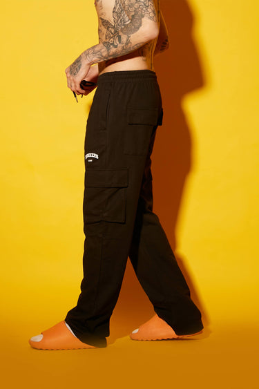 Black utility straight fit pant by Bonkers Corner, showing a close-up of the durable fabric and practical design details.