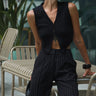 Black vest top by Bonkers Corner, sleeveless design with a fitted style, shown on a plain background.