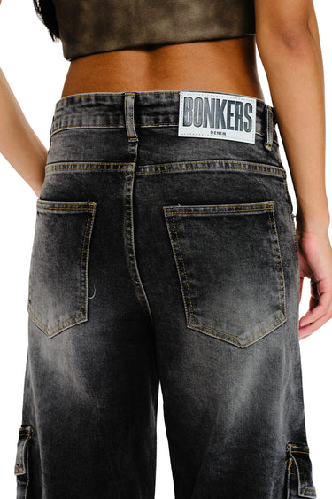 Bonkers Corner black wash workwear cargo jeans with multiple pockets and rugged denim style for durability and utility.