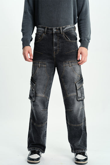 Black wash workwear cargo jeans by Bonkers Corner, featuring multiple utility pockets and a durable denim design.