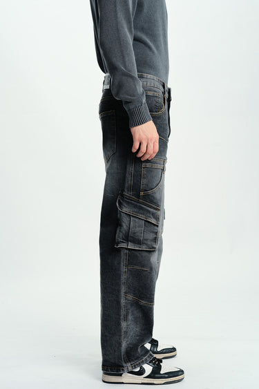 Black wash workwear cargo jeans by Bonkers Corner, featuring multiple pockets and a rugged fit, shown on a model.